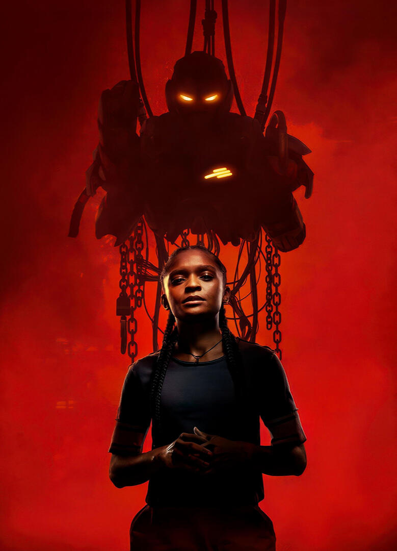 Ironheart poster with ominous armor hanging behind her