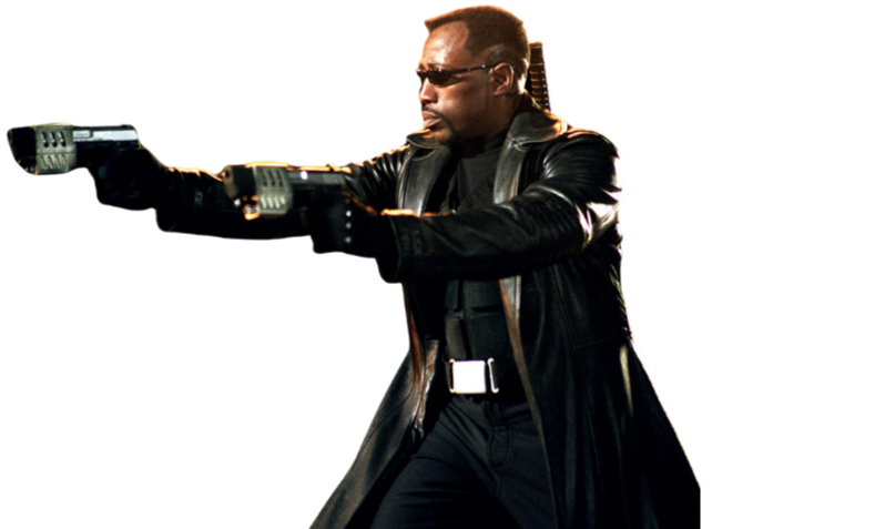 Eric Brooks/Blade holding two guns