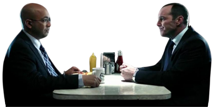 Agents Sitwell and Coulson sitting across from each other at a diner