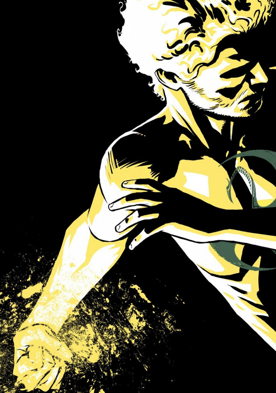 Luke Cage in a yellow shirt