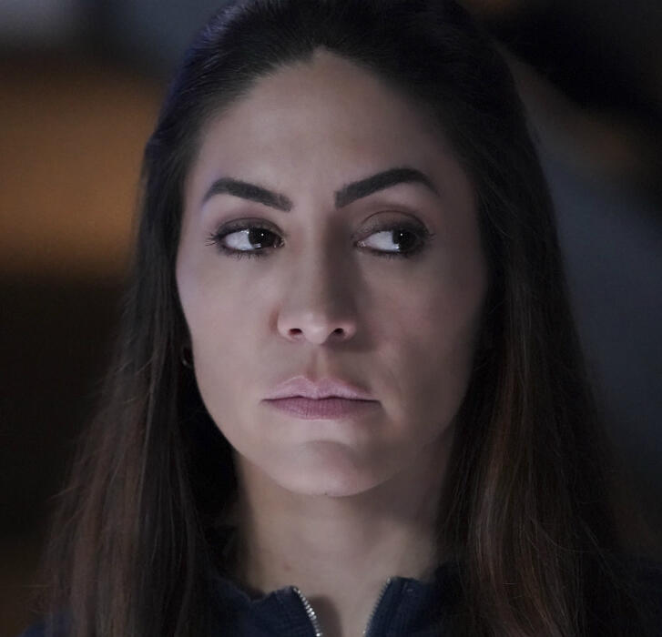 Luke Cage in a yellow shirt